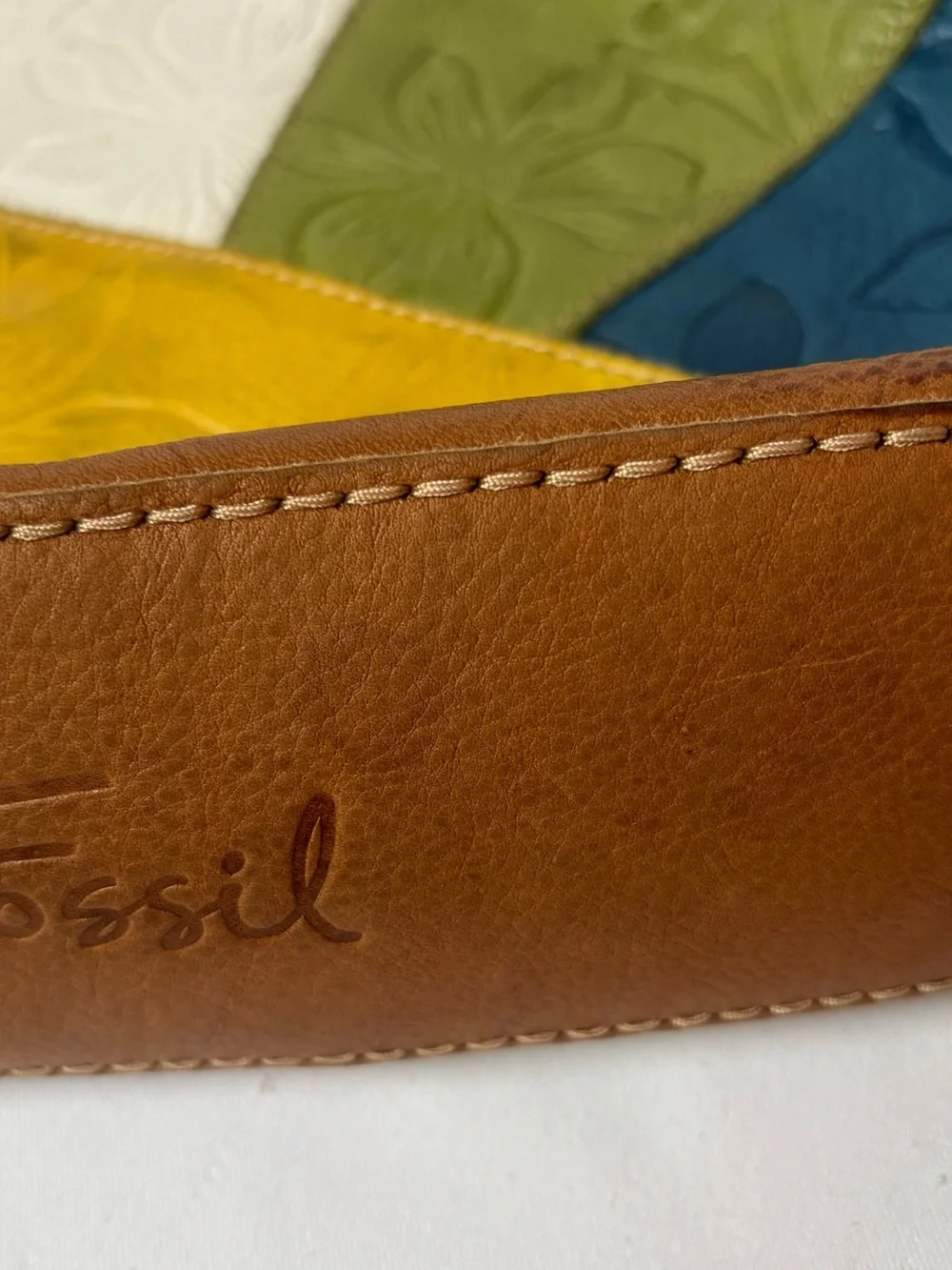 Fossil tooled leather